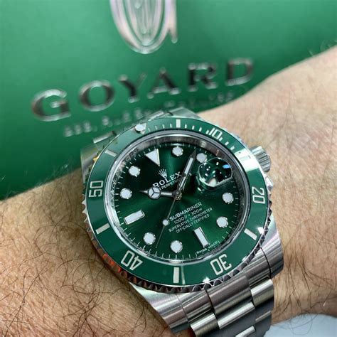 rolex gold submariner green dial.